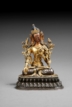 A GILT BRONZE FIGURE OF GREEN TARA
