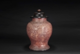 A CARVED CINNABAR LACQUER BALUSTER JAR WITH COVER
