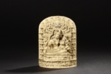 AN EXQUISITELY CARVED IVORY PALA RELIEF PANEL 'BUDDHA AND ATTENDANT'