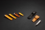 A GROUP OF FOUR AMBER SMOKING PIPE STEMS
