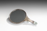 A JADEITE AND GOLD-SILVER MOUNTED HAND MIRROR WITH GEM INSET