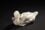 A CARVED JADE FIGURE OF DUCK