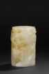 A CARVED WHITE JADE 
