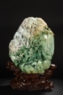 A MASSIVE CARVED JADEITE BOULDER 'SHANZI'