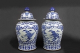 A PAIR OF LARGE BLUE AND WHITE COVER JAR WITH LANDSCAPE DESIGN