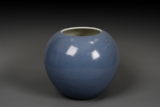 A LARGE ROUND BLUE GLAZED SCROLL POT