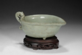 A CELADON LONGQUAN TRIPOD CUP
