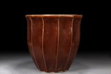 A LARGE BROWN GLAZED JARDINIERE