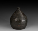 A BLACK YOUDI GLAZED VASE