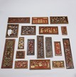 A GROUP OF CARVED WOODEN DECORATIVE PANELS