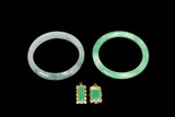 A PAIR OF JADEITE BANGLES AND PENDANTS