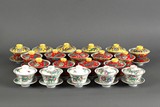 A SET OF FINELY DECORATED PORCELAIN TEACUPS