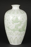 AN UNDERGLAZED GREEN VASE