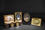 A GROUP OF FRAMED DECORATIVE WORKS