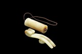 A JADE ORNAMENT AND A JADE BELT HOOK
