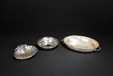 A GROUP OF THREE SILVER PLATES BY REED & BARTON