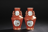 A PAIR OF FAMILLE ROSE AND GILT DECORATED WALL HANGING VASES