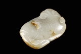 A CARVED WHITE JADE 'FISH' PENDANT