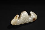 A FINE WHITE JADE BRUSH REST