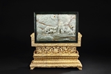 A RELIEF CARVED JADE PLAQUE INSET GILT BRONZE TABLE SCREEN