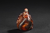A DEER-BONE CARVED SNUFF BOTTLE
