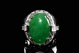A RARE AND FINE BRIGHT GREEN JADEITE DIAMOND GENTLEMAN'S RING