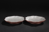 A PAIR OF YIXING FLORIFORM SAUCERS