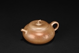 HE XINZHOU: A YIXING ‘MELON PEDICEL’ TEAPOT