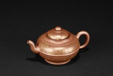 A YIXING GILT ‘LANDSCAPE’ TEAPOT