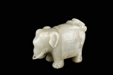 A CARVED WHITE JADE ELEPHANT