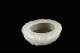 A CARVED WHITE JADE 