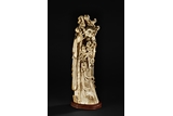 AN IVORY FIGURE OF SHOULAO