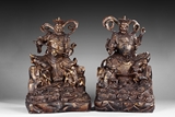 TWO BRONZE MODELS OF GILT-DECORATED BUDDHIST GUARDIAN KING