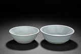 A PAIR OF CELADON GLAZED BOWLS