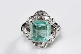 A NATURAL COLOMBIAN EMERALD DIAMOND RING