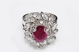 A 14K WHITE GOLD RUBY AND DIAMOND RING