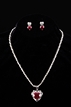 A SET OF RUBY AND DIAMOND NECKLACE AND EARRINGS