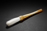 AN IVORY CARVED ‘GIFT TO YITING' BRUSH