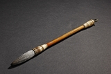 AN IVORY WRITING BRUSH INSCRIBED 