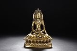 A GILT-BRONZE MODEL OF AVALOKITESVARA