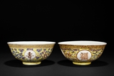 A PAIR OF FAMILLE-ROSE YELLOW GROUND BOWLS