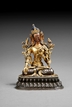 A GILT BRONZE FIGURE OF TARA