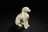 A WHITE JADE FIGURE OF DOG