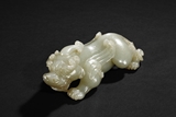 A CELADON JADE MYTHICAL BEAST 'PIXIU' CARVING