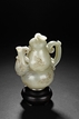 A CELADON WHITE JADE DOUBLE GOURD EWER