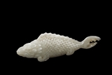 A WHITE JADE CARVING OF FISH