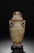 A JADE CARVED VASE WITH PHOENIX-MASK HANDLES