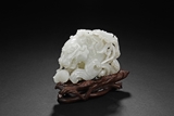 A WHITE JADE MODEL OF DRAGON