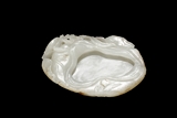 A CARVED WHITE JADE 