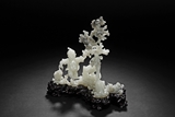 A HETIAN WHITE JADE 'BOY CATCHING CRAB' FIGURAL GROUP